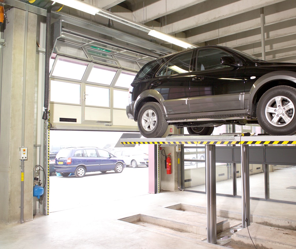 Bilgarage med Compact ledhejseport Bilgarage med Compact ledhejseport