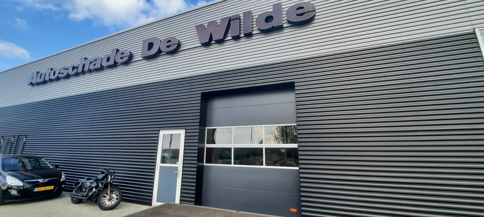 Autoschadebedrijf De Wilde KFZ Werkstatt Rolltor kaufen