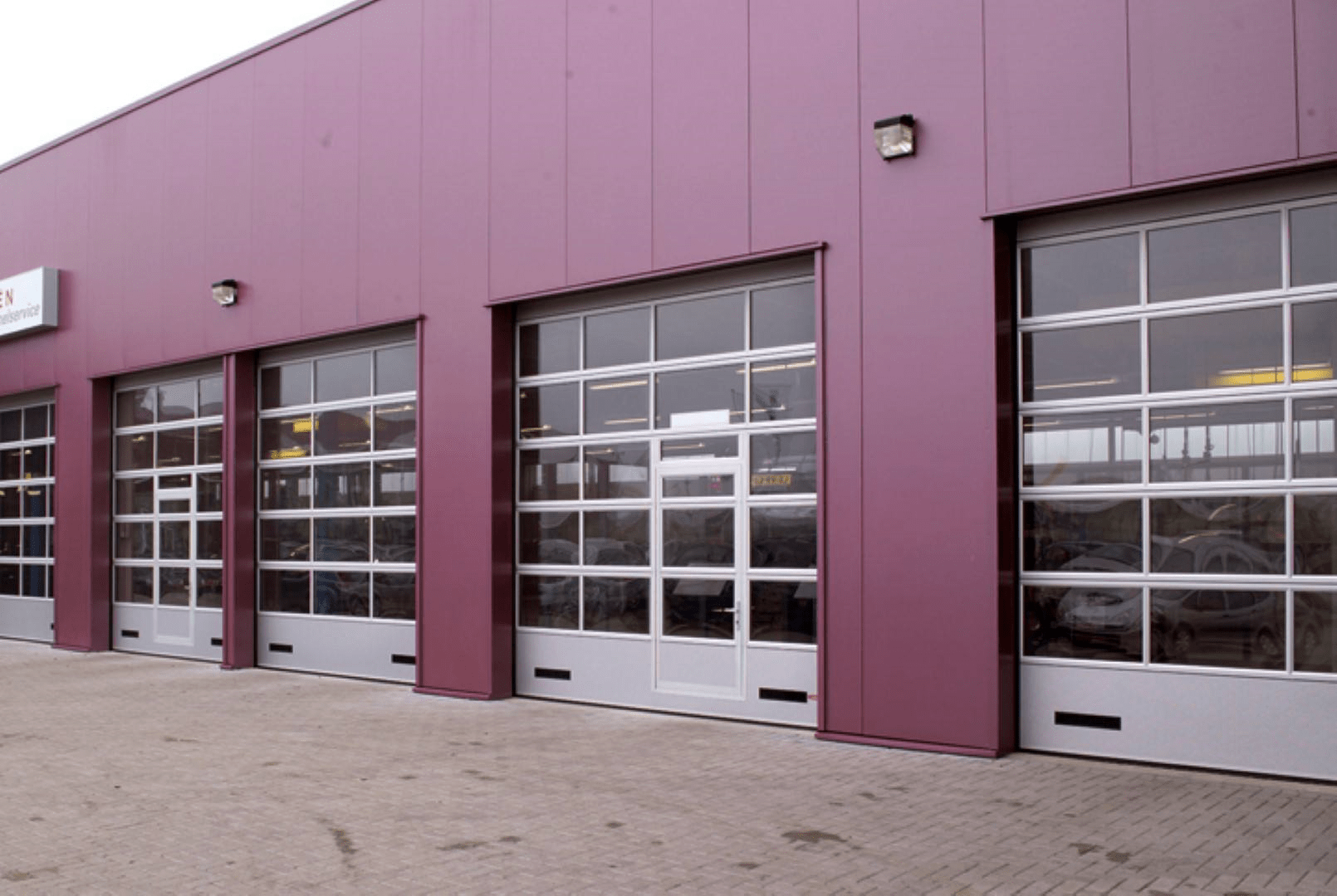 Wicket door in glazed panels