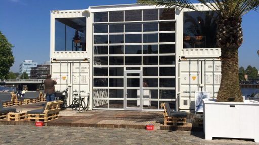 Compact folding door in temporary building