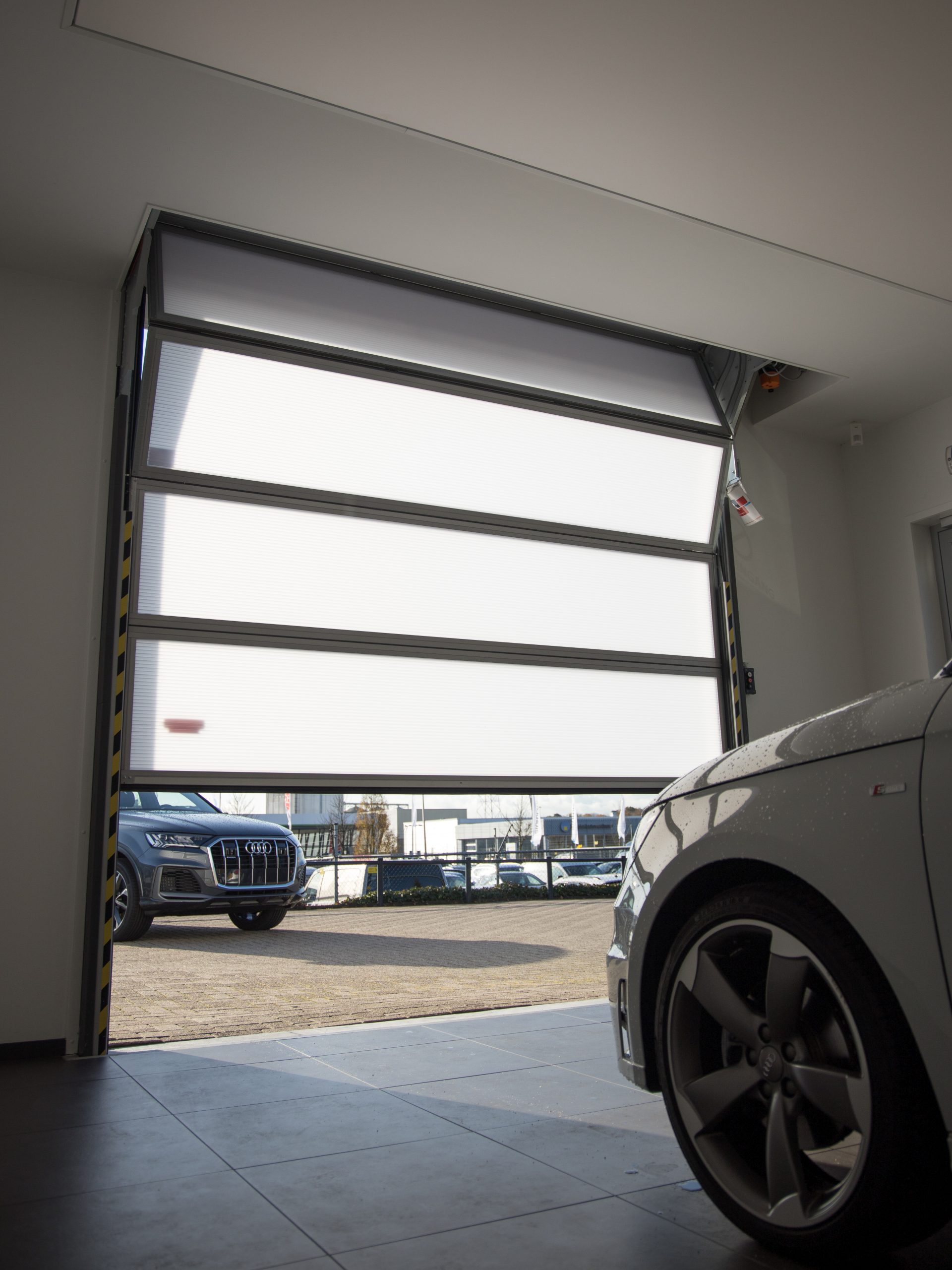 Rollershutters neatly tucked away - great alternative to a bifold garage door or roller door