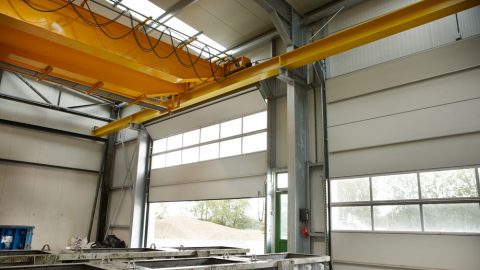 Crane track directly behind folding door