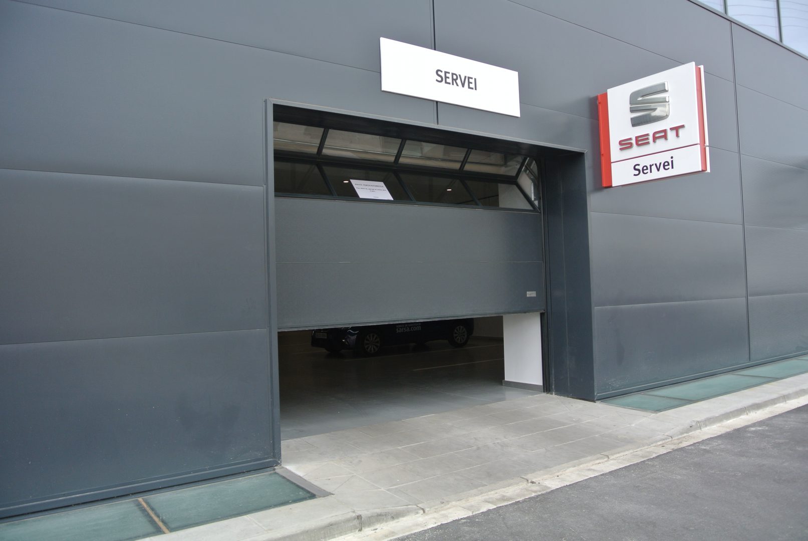 roller door car dealership from the outside