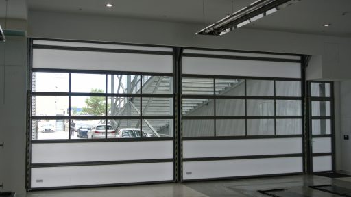 Roller door car dealership Barcelona concealed