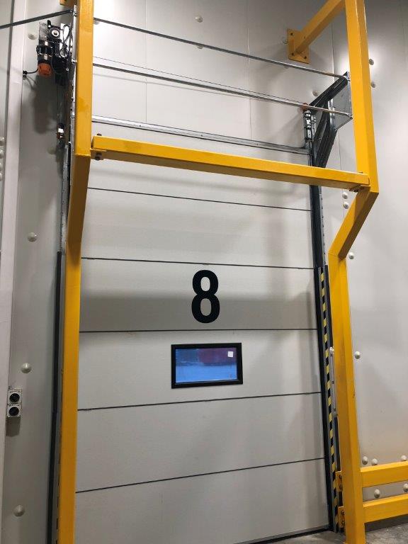 compact industrial door with extra steel frame