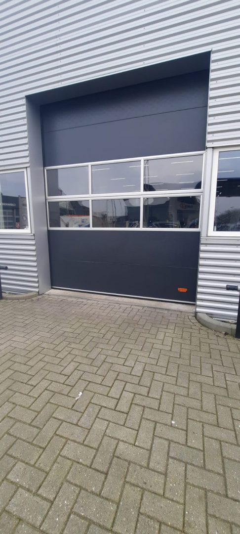 insulated roller shutters for car workshop De Wilde