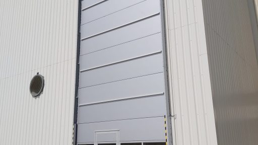 External mounted high roller doors with door and storm profiles at Fermacell
