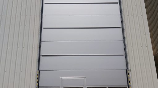 External mounted high Compact roller doors with door and storm profiles at Fermacell