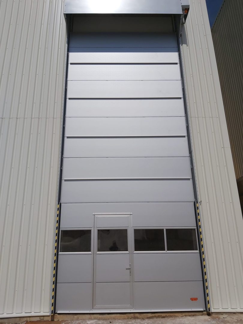 External mounted high Compact roller doors with door and storm profiles at Fermacell