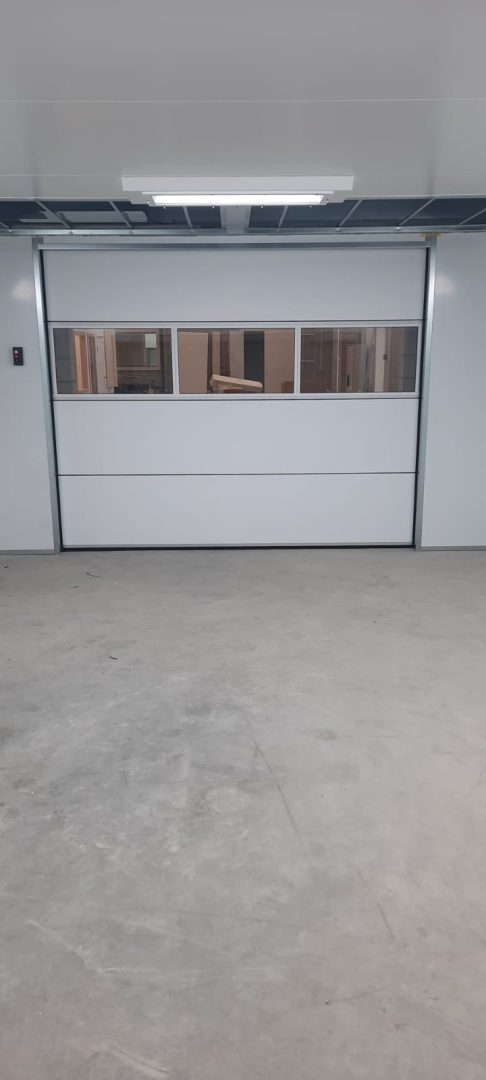 Commercial building with roller shutters