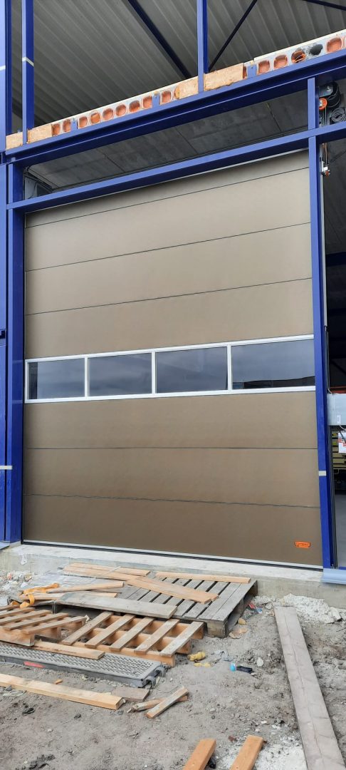 Space-saving Compact door with windows