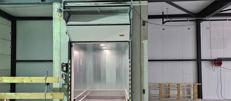 Compact folding elevator doors - space saving