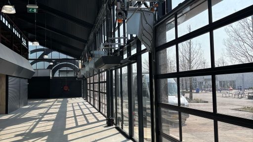 Interior view of a Compact door with daylight streaming into the market hall at Bazaar Beverwijk.