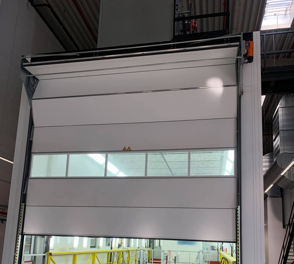 Portoni sezionali industriali portone a libro orizzontale di Rolflex